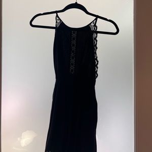 Stella Laguna Beach black lace romper with open back